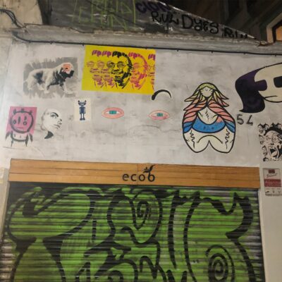 Random stickers over a steel curtain