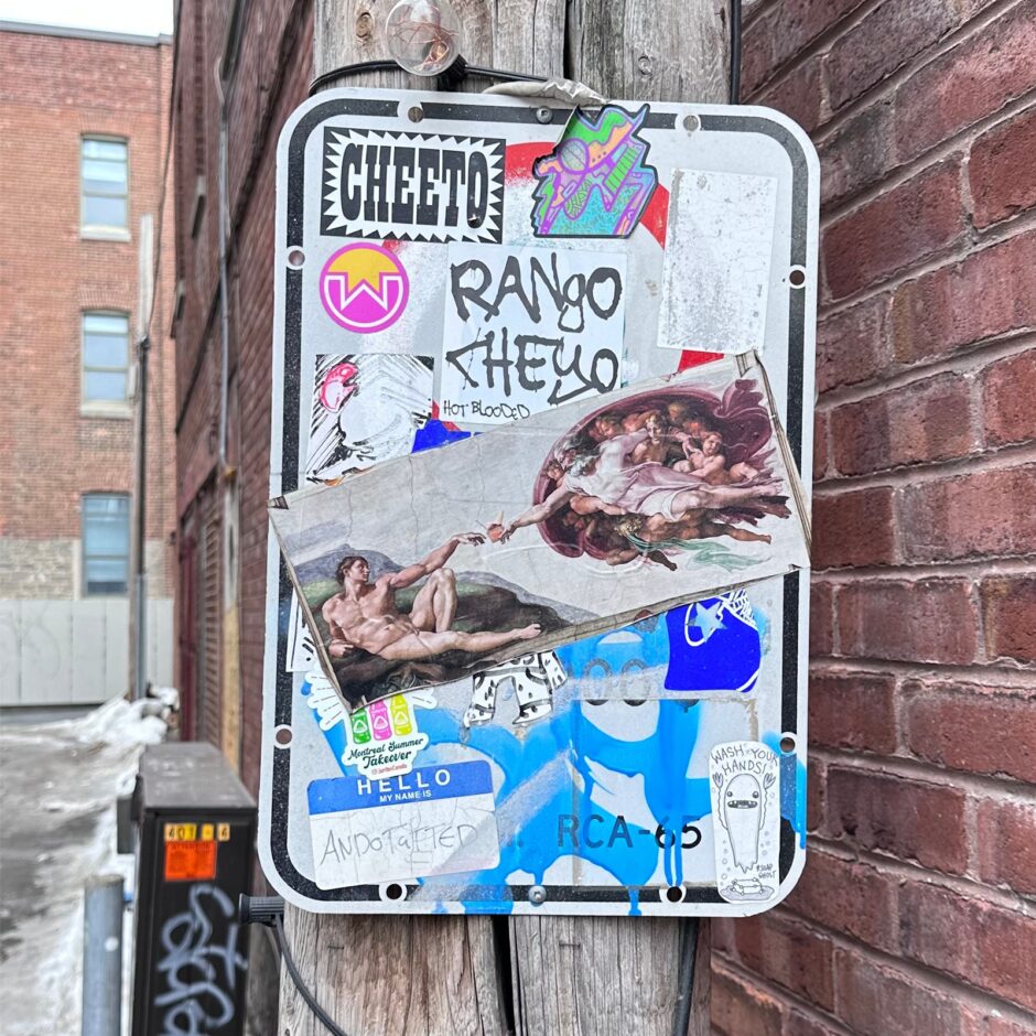 Stickers covering a parking sign