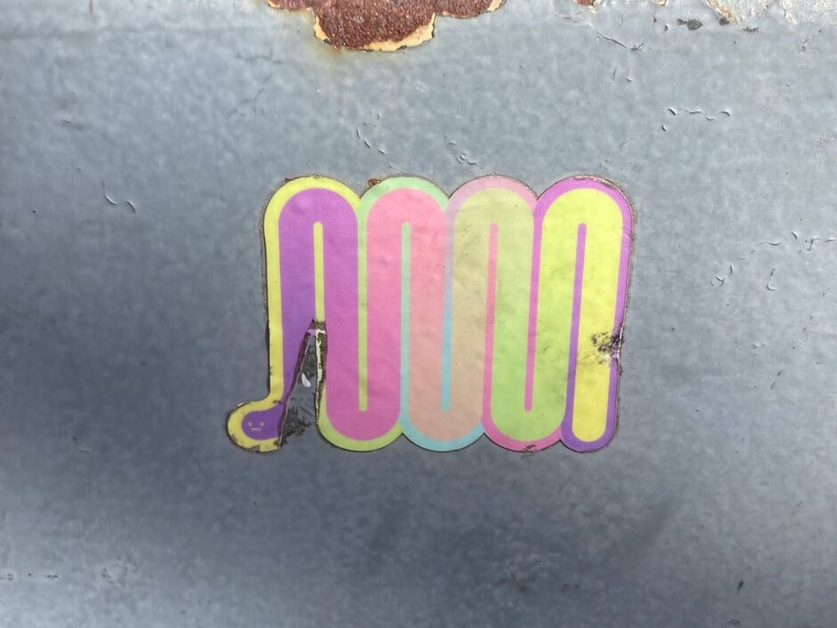 Pink to yellow gradient worm sticker