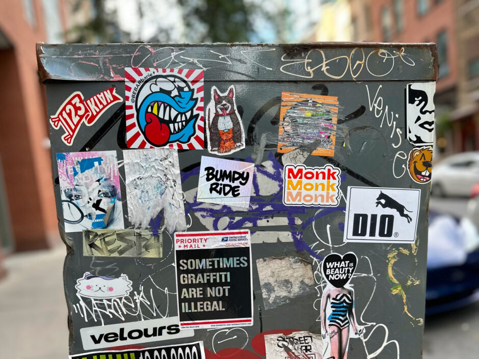Mix of stickers on a mailbox