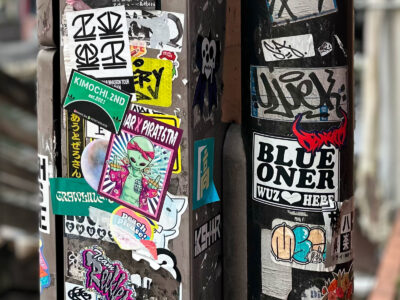 Multiple overpaying stickers on two posts