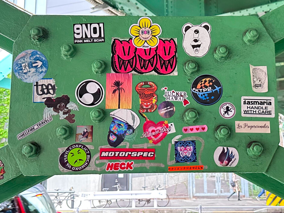 Stickers under a bridge