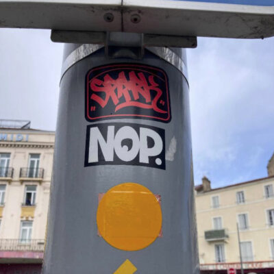 NOP sticker on post