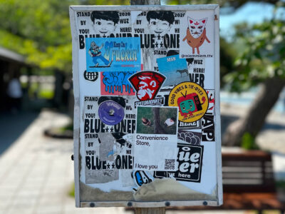 Assorted stickers on a post