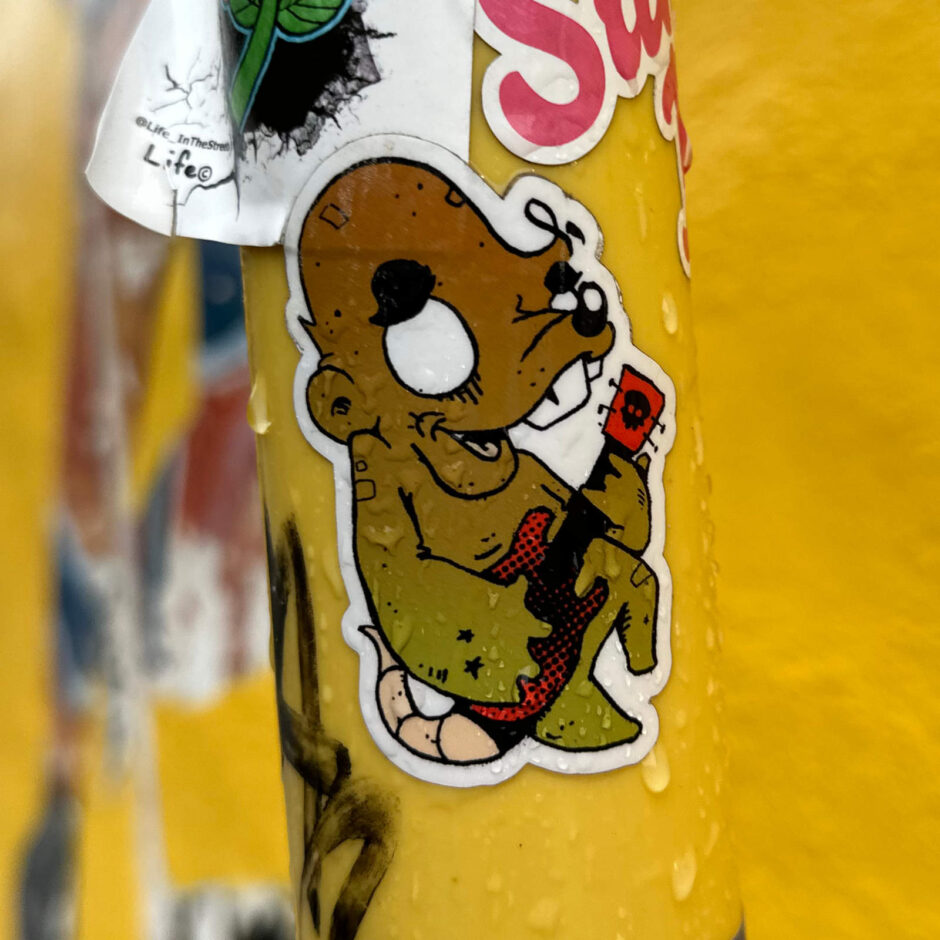 Cartoon rat playing guitar sticker