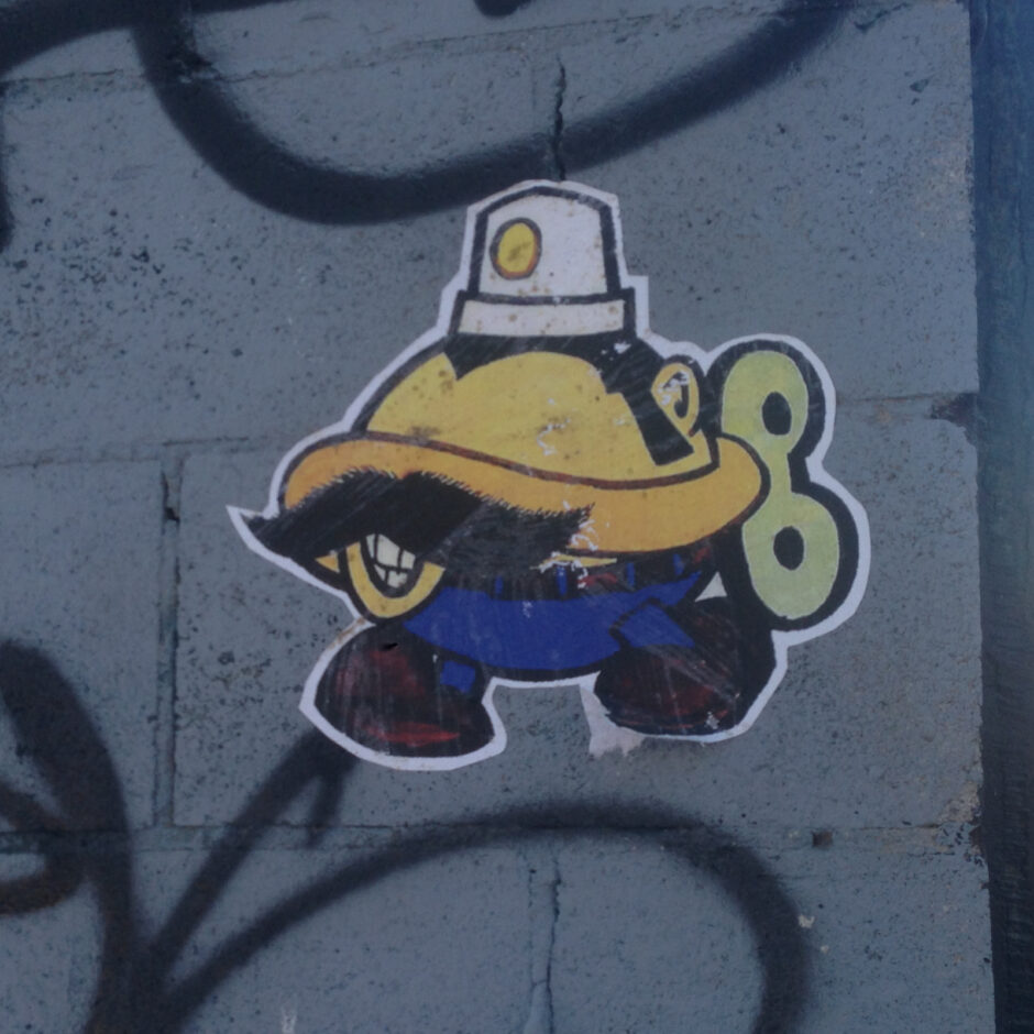 Shell with a moustache sticker
