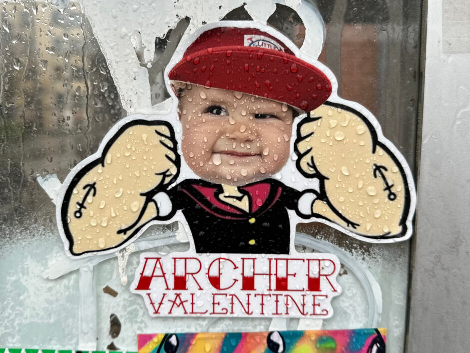 Baby face with Popeye arms