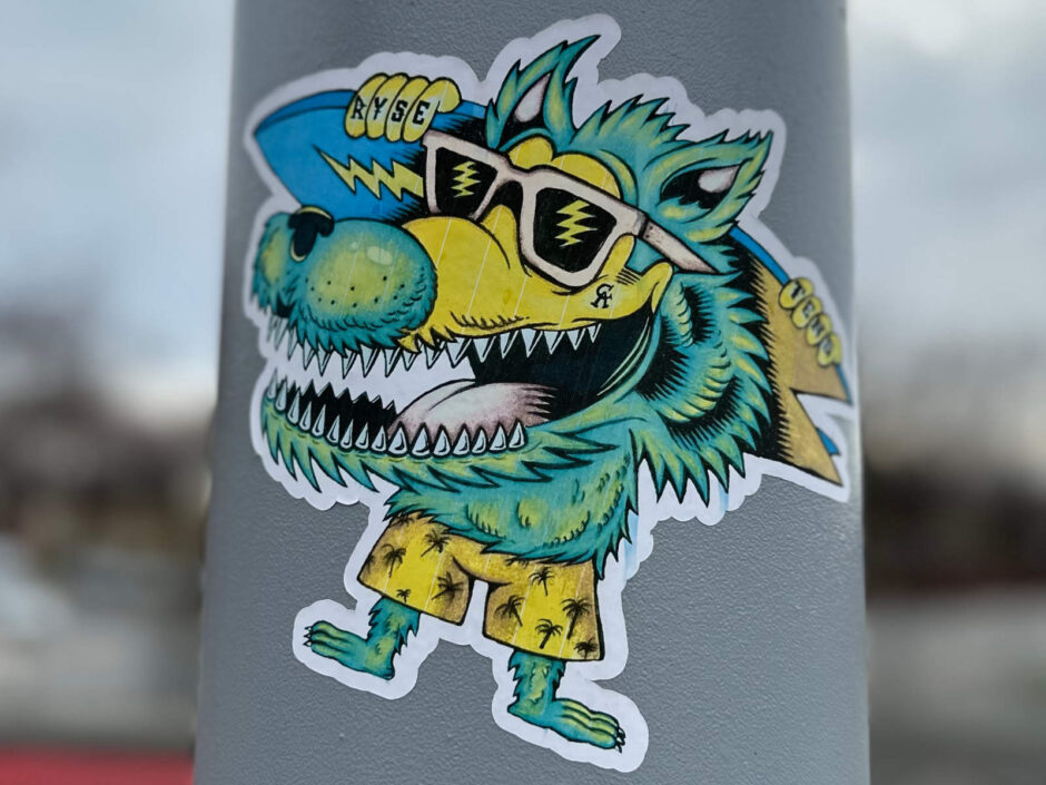 Surfing beast sticker