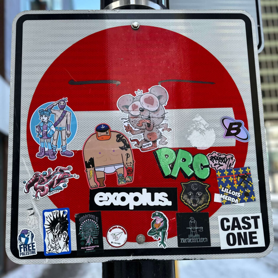 Miscellaneous sticker on a street sign