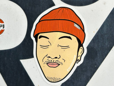 Guy with red hat sticker