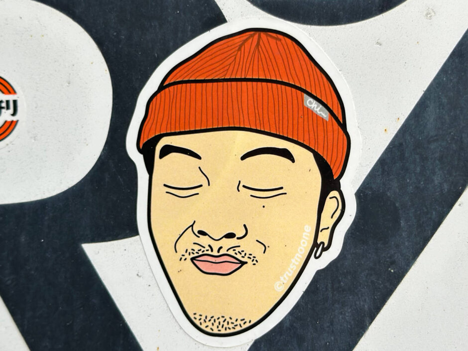 Guy with red hat sticker