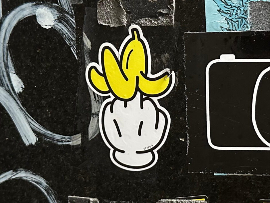 Middle finger with banana peel sticker